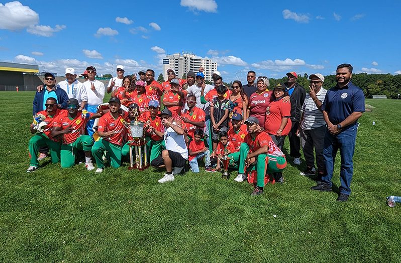 The victorious Better Hope players and supporters. OSCL President Shiv Persaud is at extreme right