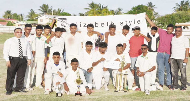 The winning Better Hope ‘B’ team pose with EECB president Bissoondyal Singh (left) and Better Hope Club president Jainarine Singh (right)