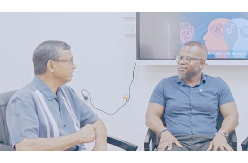 Head, Mental Health Unit,  GPHC, Dr. Bhairo Harry in discussion with Psychiatrist Tristan Griffit on mental health issues in Guyana