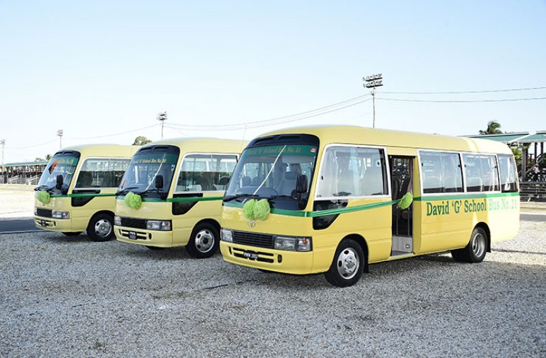The three 35-seater buses which will now serve the schoolchildren of north and south Georgetown (Photos courtesy of the Ministry of the Presidency)