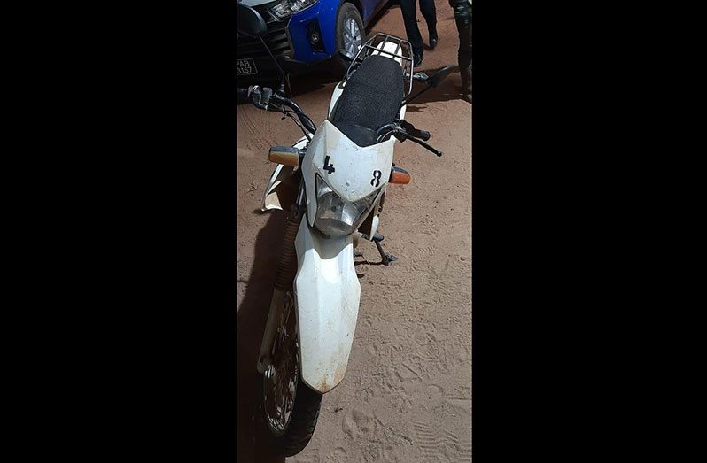 The white and black XR150 motorcycle that was recovered by the police