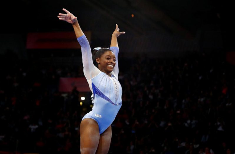 Simone Biles of the USA in action in Stuttgart, Germany. (REUTERS/Wolfgang Rattay)