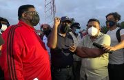President Irfaan Ali and Minister Zulfikar Mustapha listening to a resident during their visit to Black Bush Polder on Saturday