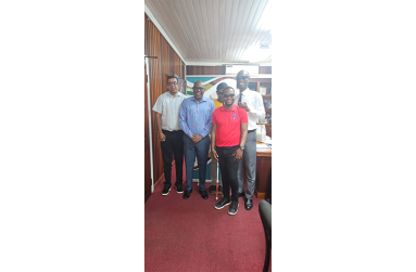 Director of Sports Steve Nivalle (Second from left) stands with members of the blind cricket team