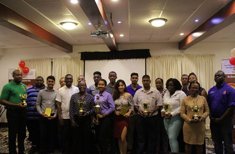 Dedicated blood donors and representatives of collaborative organisations with Chief Medical Officer (CMO), Dr Shamdeo Persaud (fourth left) and Director of the NBTS, Dr Pedro Lewis (right) (Vishani Ragobeer photo)