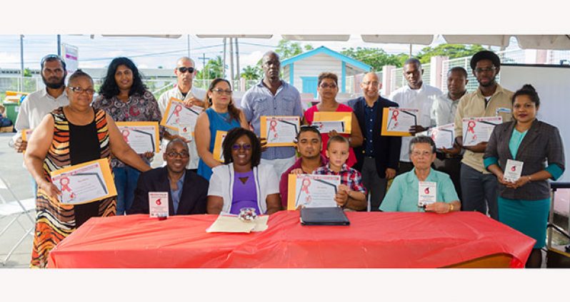 Minister within the Ministry of Public Health, Dr Karen Cummings, (centre) acting NBTS Director, Dr Pedro Lewis and PAHO representative, Dr Paul Edwards were among the individual donors and representatives of organisations who were honoured