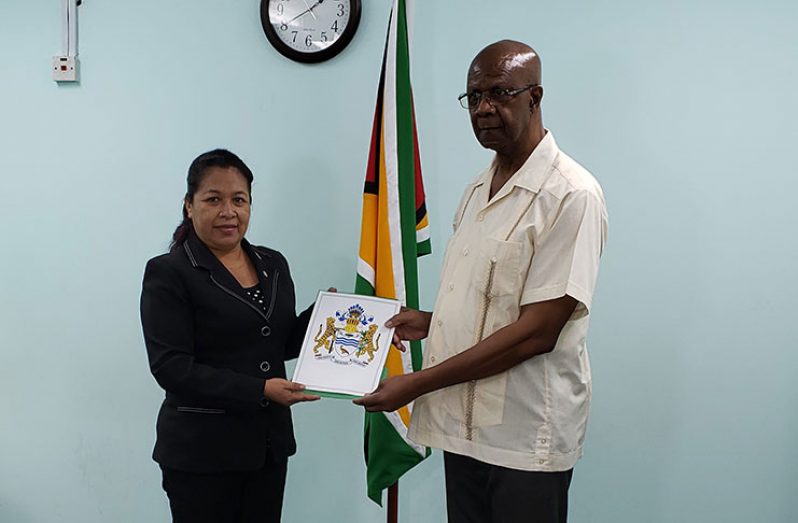 Minister of State, Dawn Hasting-Williams, formally presented the instrument of appointment to Lance Carberry at the Ministry of the Presidency