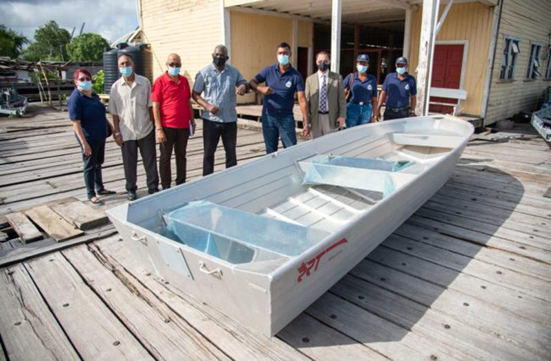 Minister of Home Affairs, Robeson Benn, hands over boat to Leguan/Wakenaam CPG