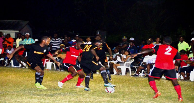 Slingerz FC hero Trayon Bobb controls the ball during his side’s 2 – 1 win over rivals Alpha United. (Adrian Narine photo).