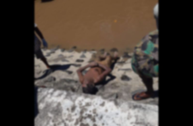 The body after being fished out of the koker
