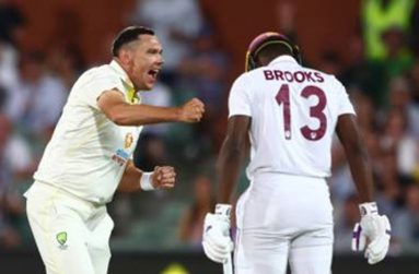 Shamarh Brooks is forlorn as Scott Boland celebrates his wicket yesterday, the third day of the second Test.
