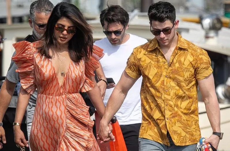 The Bollywood star married US singer Nick Jonas (right) in 2018 (GETTY IMAGES)