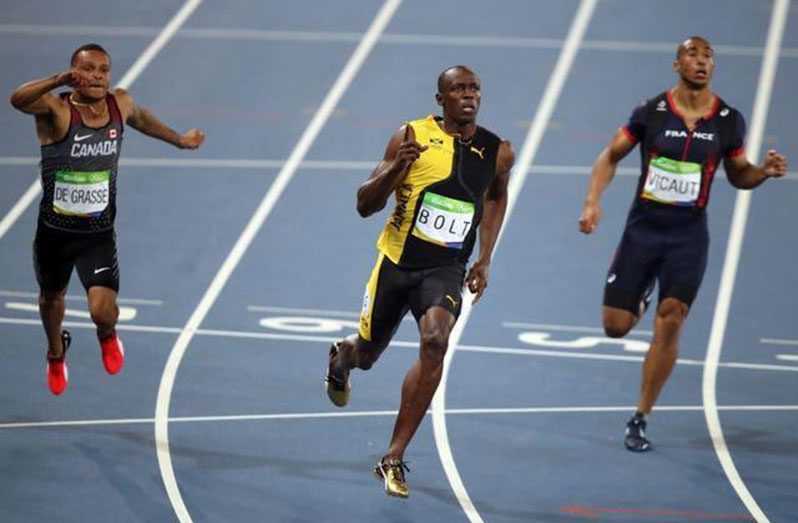 Usain Bolt took victory ahead of Gatlin and De Grasse. (Mike Egerton/PA)