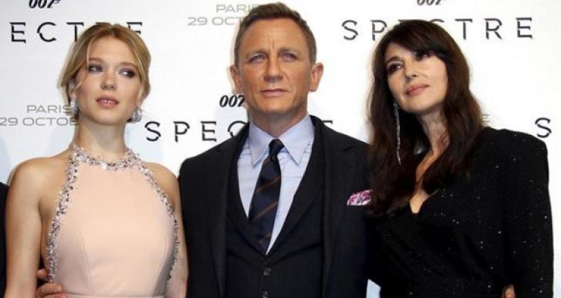 Actors Lea Seydoux, Daniel Craig and Monica Bellucci (L-R) pose for photographers on the red carpet at the French premiere of the new James Bond 007 film ''Spectre'' in Paris, France.