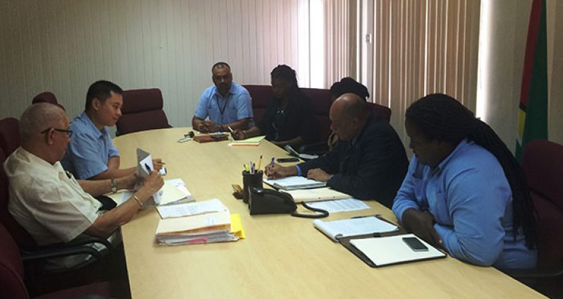 The Minister of Natural Resources and the Environment at a meeting with Bosai officials Wednesday