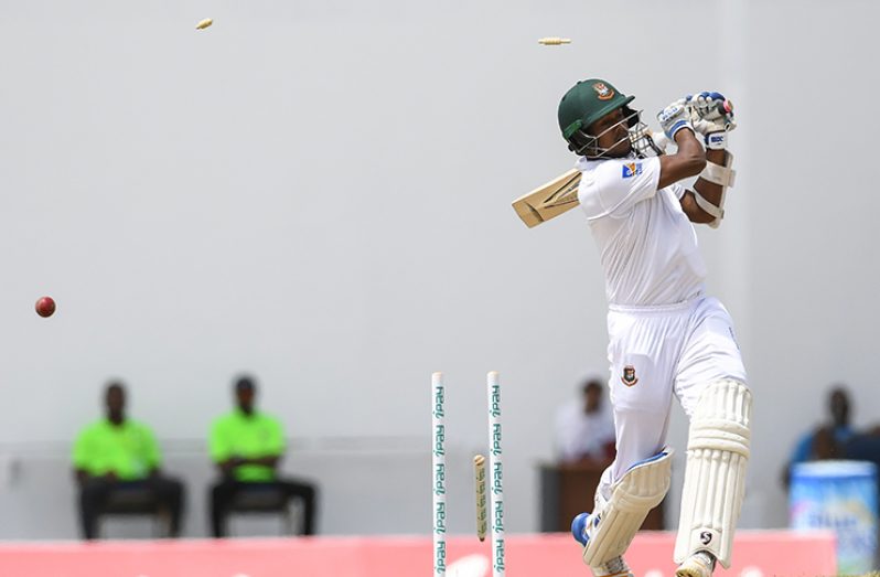 Kamrul Islam Rabbi is bowled on the second day of the first Test between WINDIES and Bangladesh on Thursday, July 6, 2018 at the Vivian Richards Cricket Ground.© CWI Media/Randy Brooks of Brooks Latouche Photography