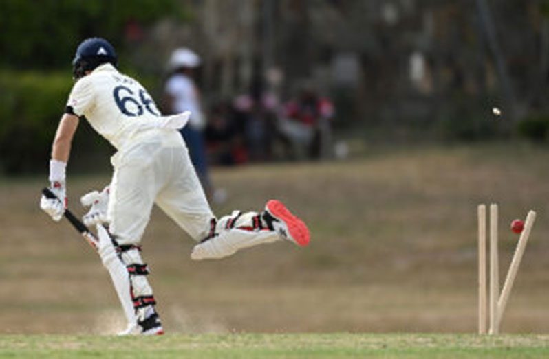 England captain Sherman Lewis is yorked by fast bowler Sherman Lewis (out of picture) on Tuesday. (Photo courtesy CWI Media)