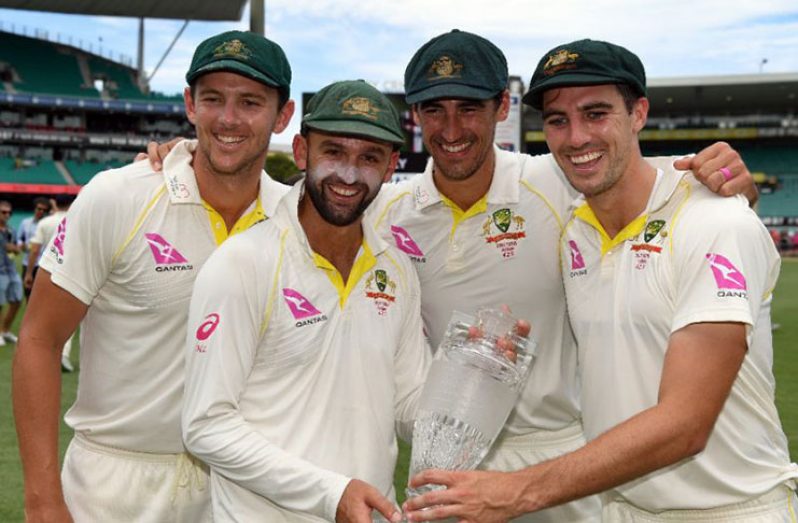 Australia's bowling attack of Josh Hazlewood (L), Nathan Lyon (2/L), Mitchell Starc (2/R) and Pat Cummins celebrate after defeating England and retaining the Ashes (AFP Photo/William West)