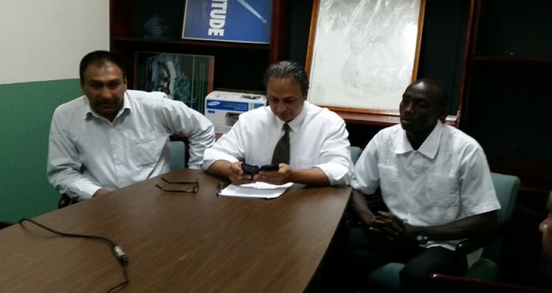 Aleem Hussain of NexGen Promotions, GBBC president Peter Abdool and Dexter Gonsalves, seated at the head table, announce details for the Next Generation Boxing-Giftland Showcase Pro Am card.
