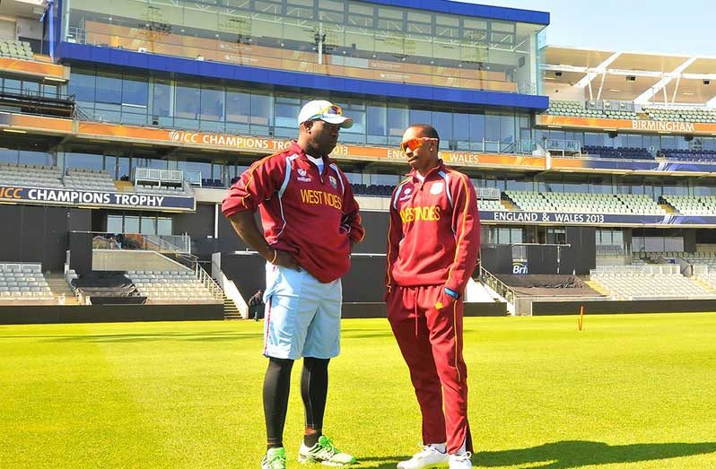 Dwayne Bravo (right) and Otis Gibson