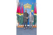 President, Dr Irfaan Ali (left) and Governor of the State of Roraima Antonio Olivério Garcia (right)