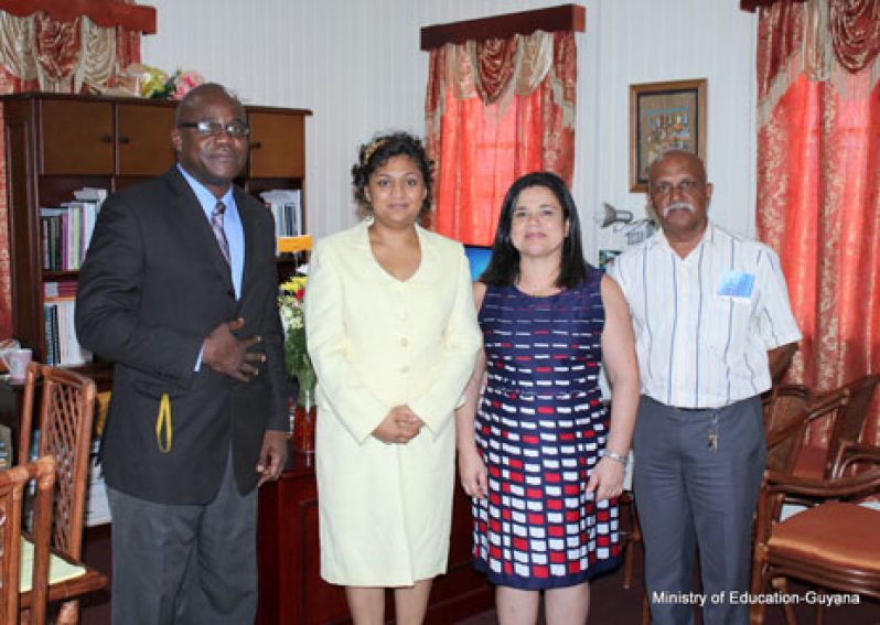 (From Left) Chief Education Officer, Olato Sam, Minister of Education, Ms. Priya Manickchand, Chancellor of the Federal University of Roraima State, Brazil-- Professor  Dr. Gioconda Martinez and Dr. Meer Khan