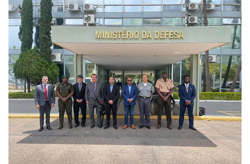 Deputy Police Commissioner ‘Operations’ (ag.)  Ravindradat Budhram (fourth from right) flanked by other officials at Brazil’s Ministry of Defence