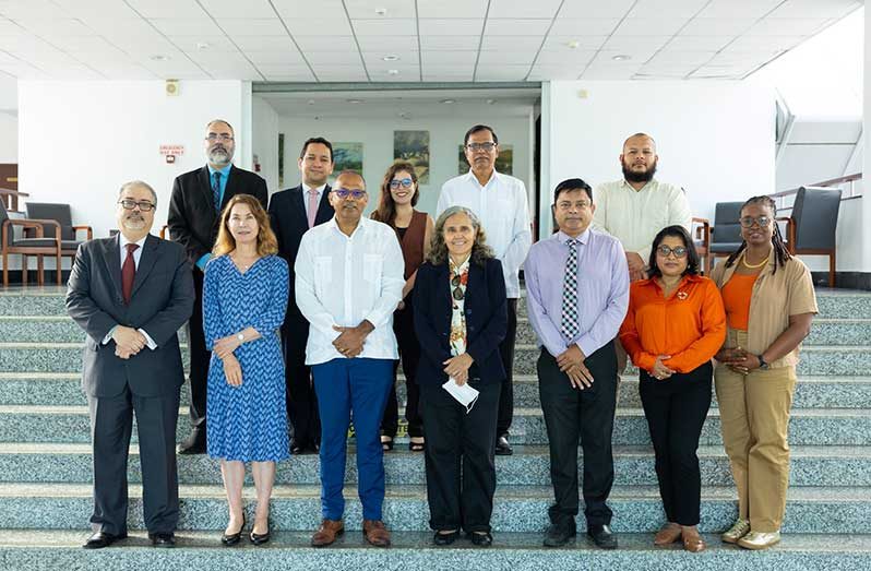 Minister of Health, Dr. Frank Anthony (third from left at front) with Guyanese officials and the Brazilians delegation