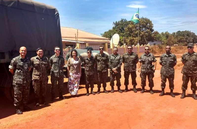 A Brazilian military contingent stands alongside the Vice-Consul of Brazil in Lethem , Lisa Mary Reis on Monday at the Rupununi border town. (Photo credit- Office of the Vice- Consul of Brazil in Lethem)