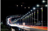 The recently commissioned Dr Bharrat Jagdeo River Bridge captured as the lights from vehicles illuminate the thoroughfare (Delano Williams photo