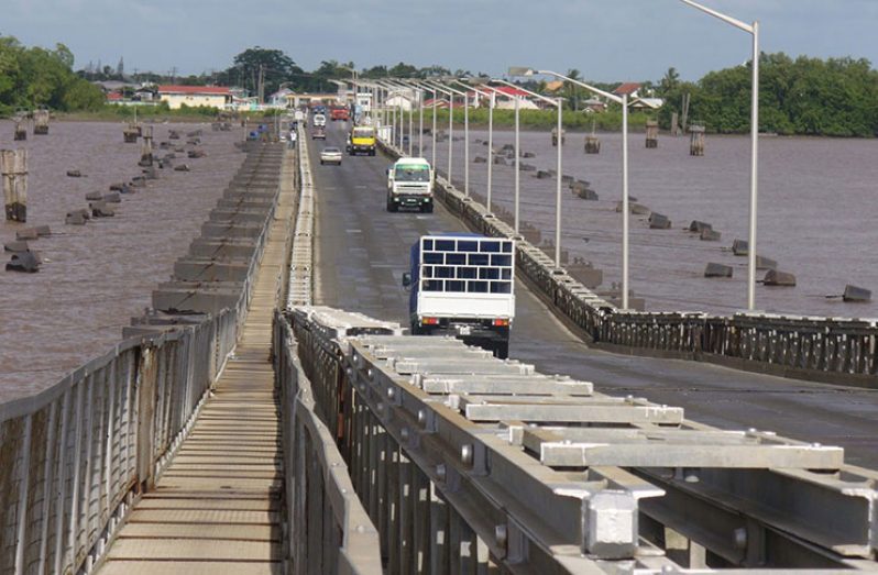 Vehicles traversing the Demerara Harbour Bridge