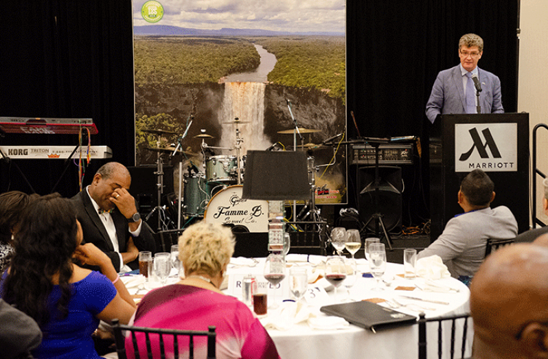 British High Commissioner to Guyana, Greg Quinn ( top right) delivering the feature address at the Tourism and Hospitality Association of Guyana (THAG) Annual Dinner and Auction at the Marriott Hotel