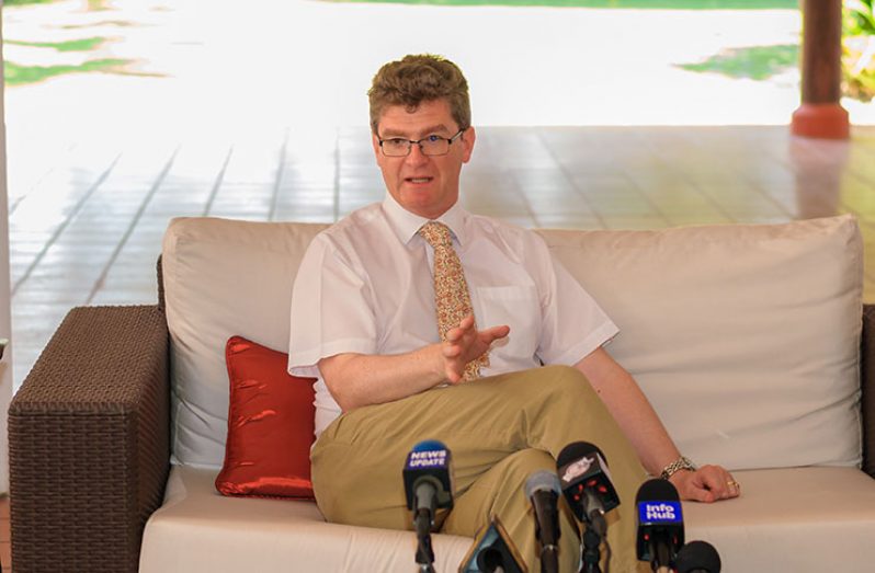 British High Commissioner, Greg Quinn, speaking to reporters on Thursday at his Bel Air Gardens residence (Delano Williams Photo)