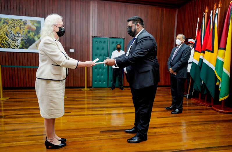 President, Dr. Irfaan Ali accepts the Letters of Credence from new British High Commissioner to Guyana, Mrs. Jane Miller (Office of the President photo)