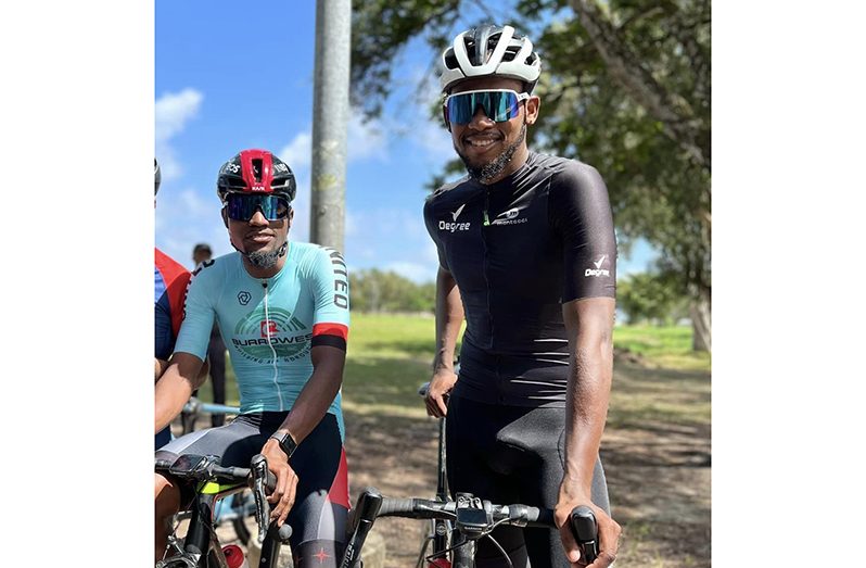 Briton John (left) won the race ahead of Jamual John