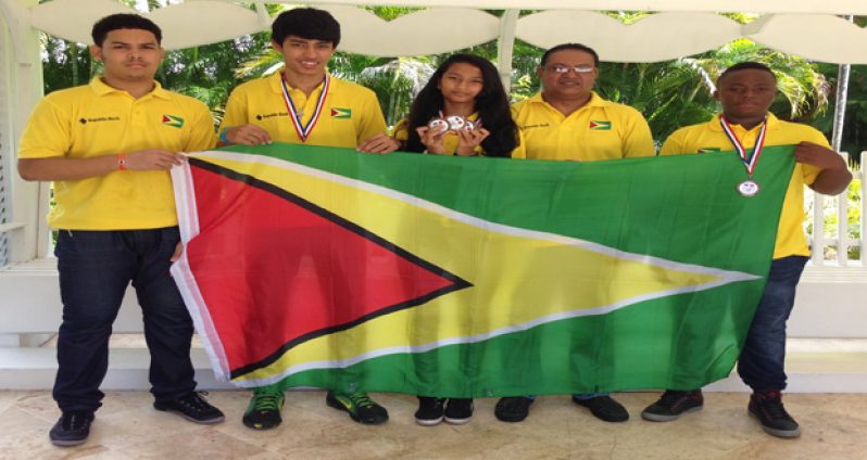Team Guyana pose with their bronze medals.