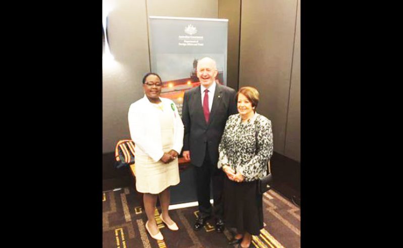 Minister within the Ministry of Natural Resources, Simona Broomes and Governor Peter Cosgrove and his wife
