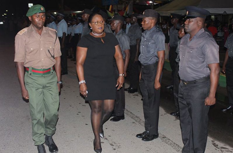 Minister Simona Broomes inspecting the guard of honour