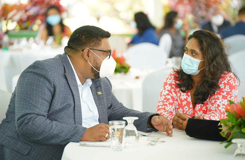 President Dr. Irfaan Ali and President of the Guyana Press Association (GPA), Nazima Raghubir, having an intense conversation during
the Presidential Media Brunch, held at State House, Georgetown, on Sunday (Latchman Singh photo)