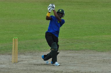 Demerara opener Trevon Griffith hits one over the top, during his robust half-century yesterday