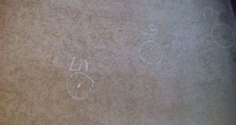 The three bullet holes in the wall of the officer house