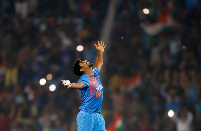 Pacer Jasprit Bumrah rejoices during his match-winning final over against England in Nagpur,