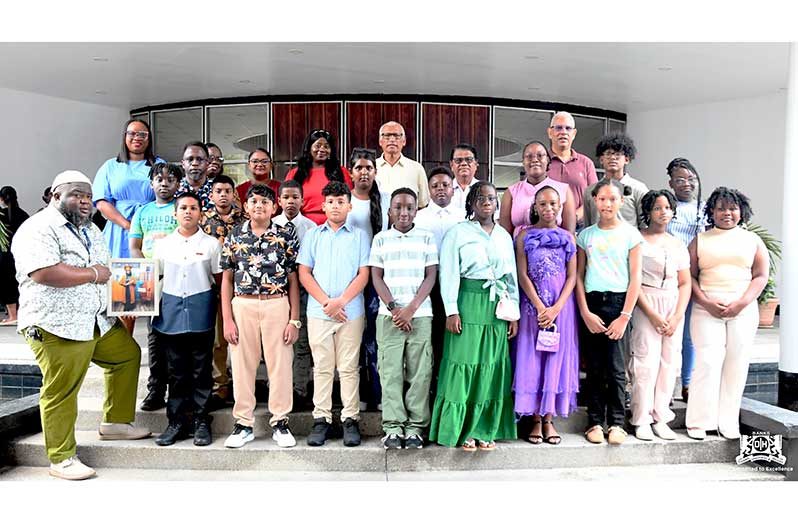 Banks DIH Limited’s 2026 Bursary Awardees with company officials (Banks DIH photo)
