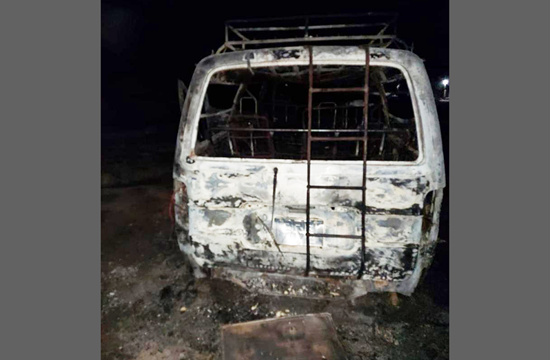 The charred remains of the RZ minibus after being destroyed by fire