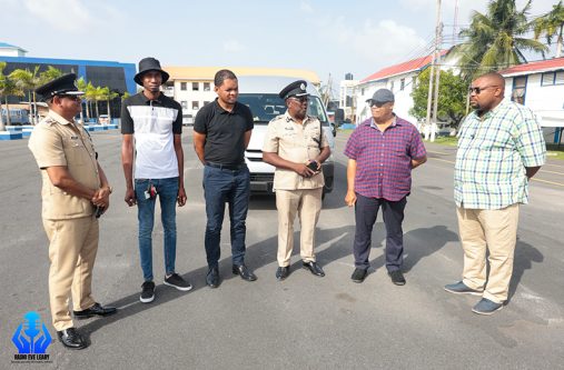 Deputy Commissioner (Operations) Errol Watts (third from right) and Senior Superintendent Himnauth Sawh, Head of the GPF’s Transport Workshop (first from left) flanked by a retired Senior Superintendent, Gladford Thomas who served the GPF for 36 years, and his son Edgar Thomas who presented the vehicles along with other officials