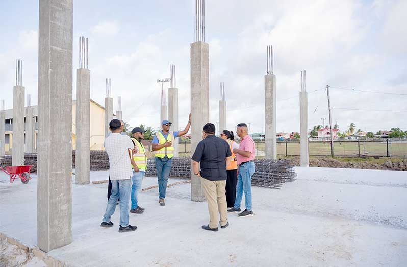 Minister of Education, Sonia Parag and team inspect ongoing expansion works at the Bush Lot Secondary School, Region Five, to ensure timely progress and improved learning facilities for students