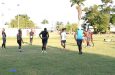 Coach Butts going through drill with Green Machine