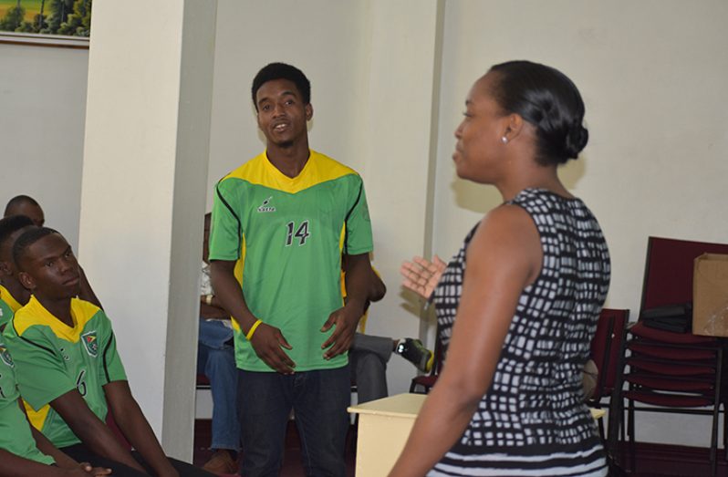 CANU’s Legal Officer Konya Sandiford during an interaction with one of the National U-20 players