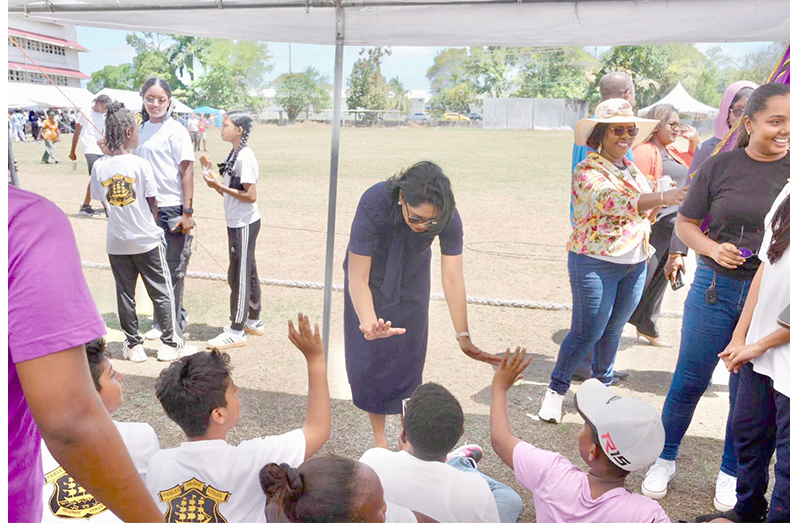 Education Minister Sonia Parag visits distribution sites at Diamond Secondary School and Queen’s College