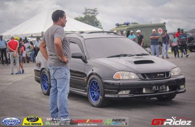 S&D Performance owner/mechanic Shawn Persaud watches his son Damion during a drag meet last year. (GTRidez photo)